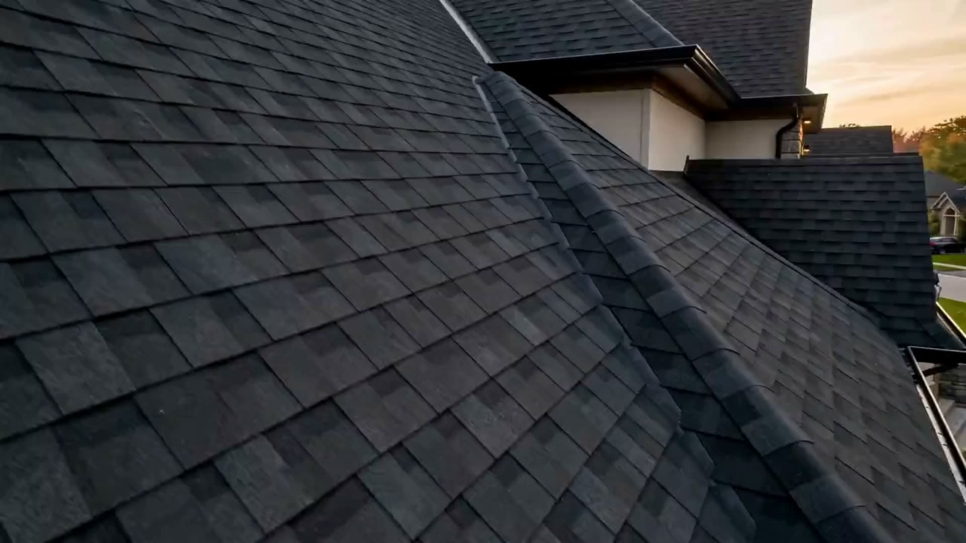 Warm dusk lighting over a residential roofline